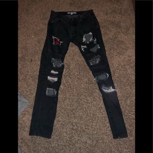 Destroyed black jeans
